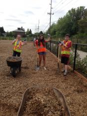 Moving mulch at Tualatin Community Park dog run